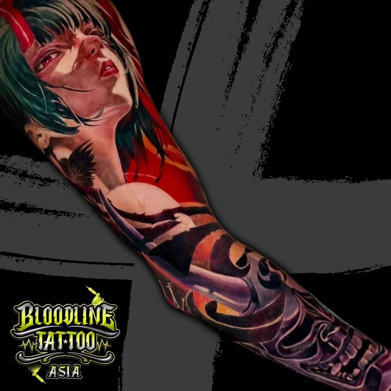 Colour anime-style full sleeve tattoo of a horned woman with green hair above a purple Hannya mask on the arm at Bloodline Tattoo Bangkok.