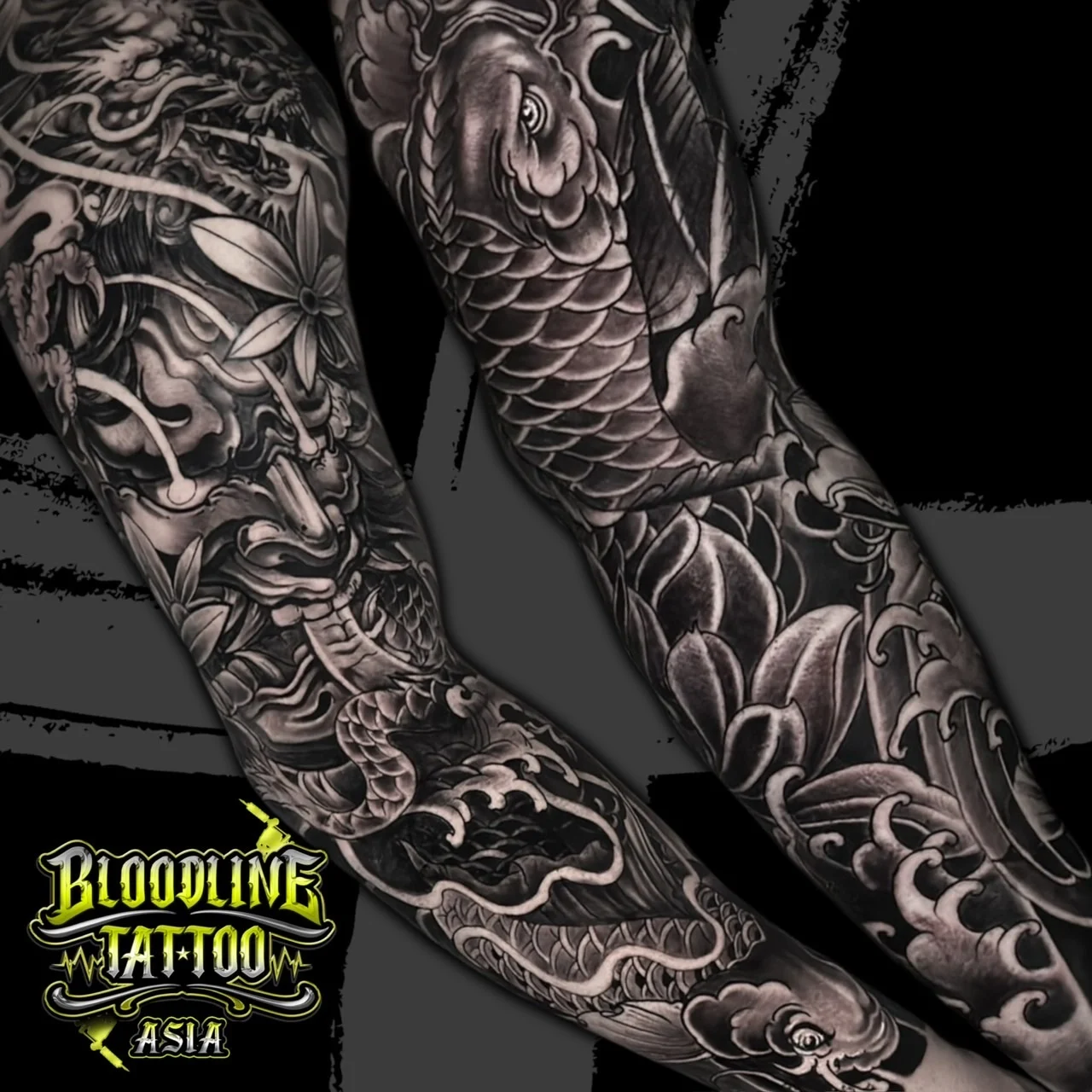 Black and grey Japanese Irezumi sleeve with Hannya mask, koi fish, snake, dragon, waves, and sakura at Bloodline Tattoo Bangkok.