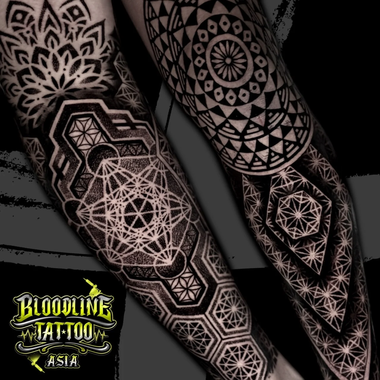 Dual forearm views of blackwork sleeves with Metatron's Cube, floral mandalas, and hexagonal star dotwork, at Bloodline Tattoo Bangkok.