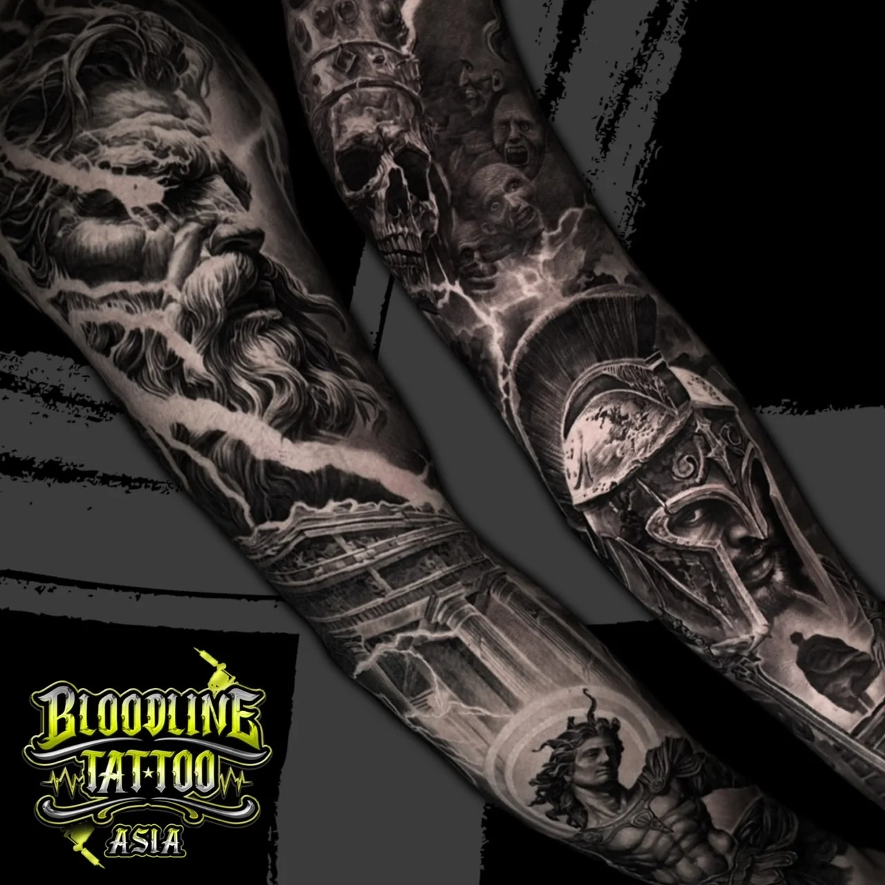 Dual black and grey realism sleeves with Zeus and a lightning-struck Greek temple on one arm and a crowned skull with a Spartan warrior on the other, at Bloodline Tattoo Bangkok.